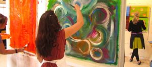woman painting in santa fe intuitive workshop